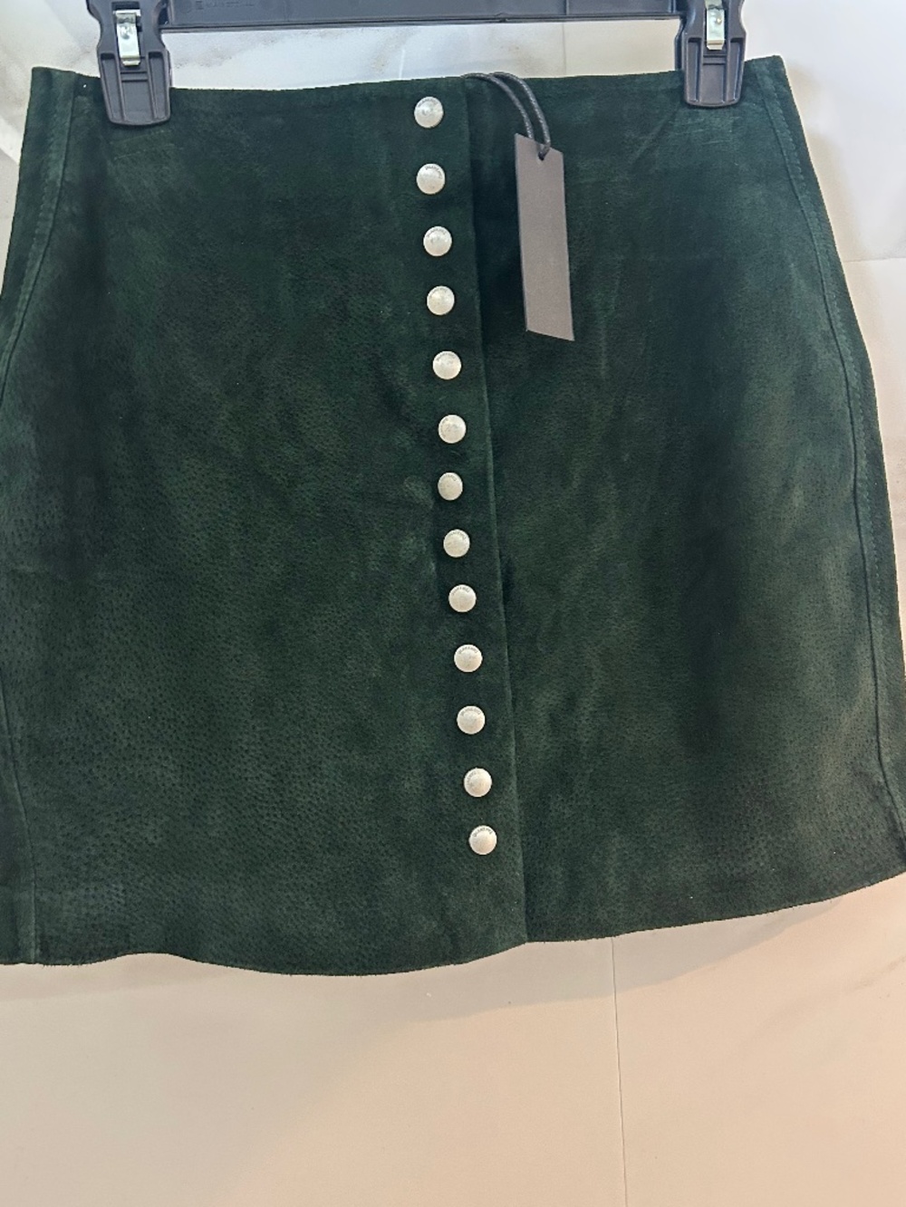 Suede dark green mini skirt